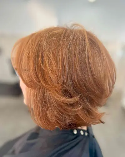 Voluminous Short Ginger Bob with Butterfly Layers
