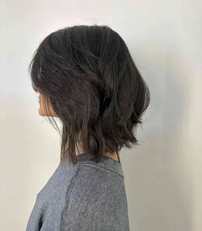Shoulder-Length Butterfly Textured Bob with Side Bangs