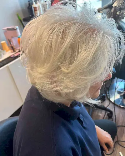 Short Butterfly Bob Haircut with Wavy Layers for Older Ladies with White Hair