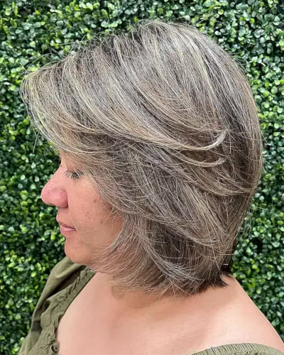 Layered Bangs and Blonde Highlights on Butterfly Short Bobbed Hair