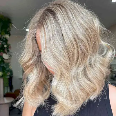 Bright Blonde Angled Lob with Loose Waves