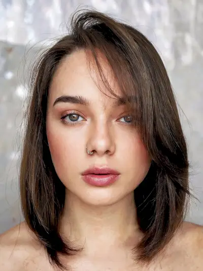 Chic Layered Bob with a Deep Side Part for Fine Hair