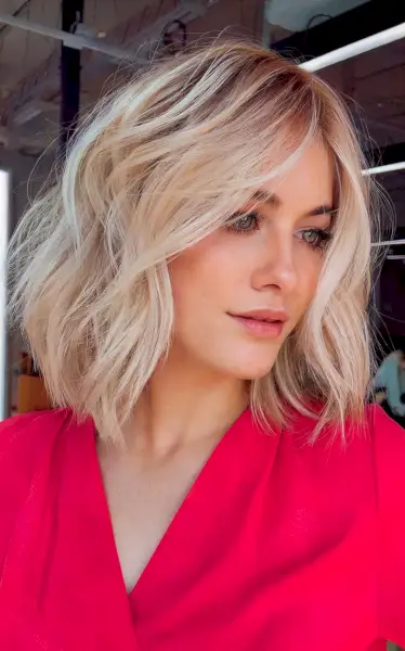 Layered Bob with Beach Waves and Blonde Balayage for Fine Hair