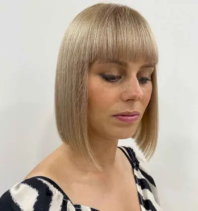 pretty blonde bob with bangs