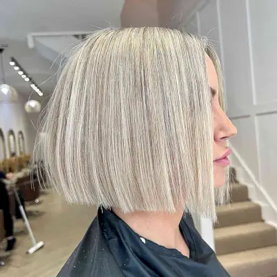 One-Length Blunt Bob with Scalp Foiling for ladies with a modern style