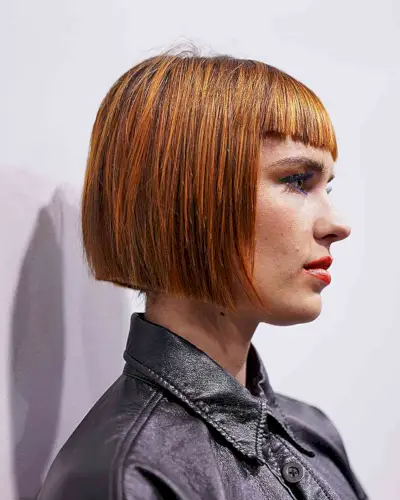 One-Length Precision Bob Cut with Orange-Yellow Highlights