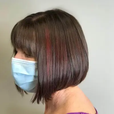 Brown and pink shorter graduated bob with fringe