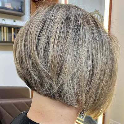 Short Dirty Blonde Balayage on a Graduated Bob Cut