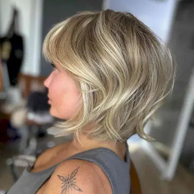 Short Light Blonde Messy Feathered Bob