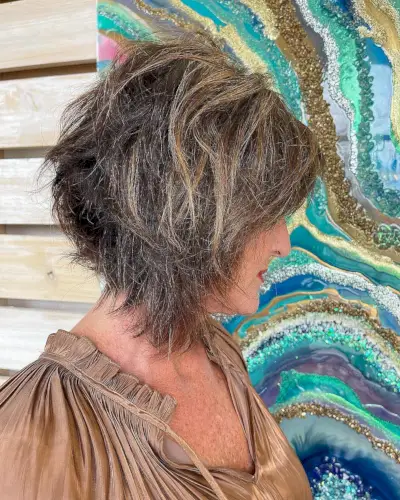 flattering messy bob hairstyle for women over 50