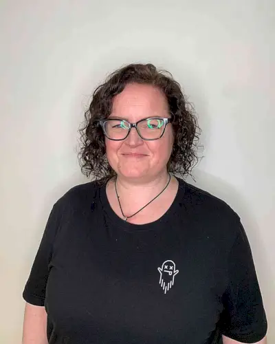 Curly Bob Cut with Side Part for Older Women with Round Face Shapes