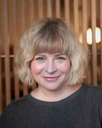 Chin-Grazing Tousled Bob with Soft Bangs for Women with Round Faces