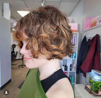 Short Curled French Bob with Blonde Highlights