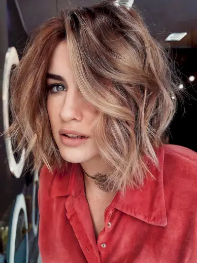 textured bob with layered waves for fine hair
