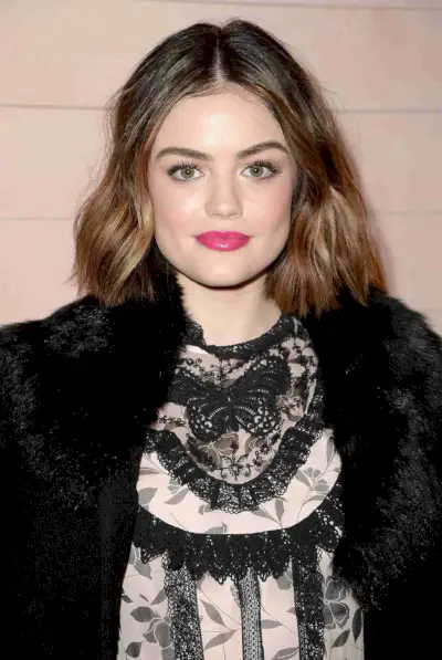 Lucy Hale with a long bob haircut and middle part