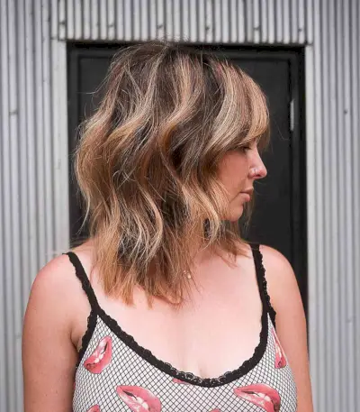 Long bob haircut with cascading layers