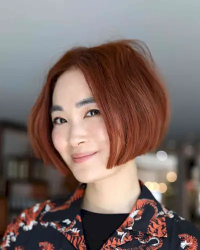 Jaw-Grazing Traditional Boyfriend Bob with Copper Red Tone