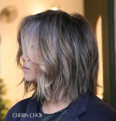 Choppy Lob with Face-Framing Layers for Women with Thick Hair
