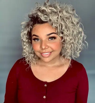 Dashing blunt cut bob hairstyle with a deep side part