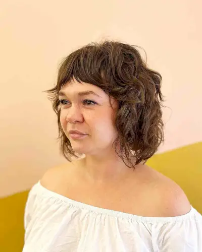 Curly Shaggy Bob with Short Curtain Bangs