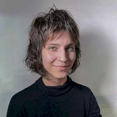 Edgy Shagged Bob with Shorter Layers and Curtain Bangs