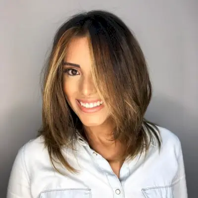 Dark Honey Brown Hair with a Face-Framing Middle Part