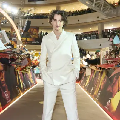 Timothée Chalamet porte un look Gucci ivoire chic lors de la projection des fans de Dune : Part Two en Corée du Sud, à Séoul, le 22 février 2024.