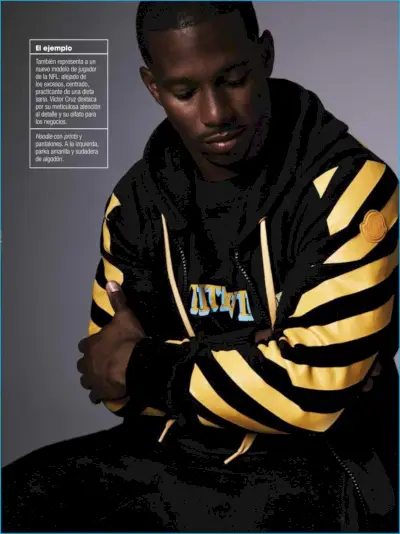 Victor Cruz는 GQ España를 위해 Moncler O의 검정색과 노란색 앙상블을 입었습니다.