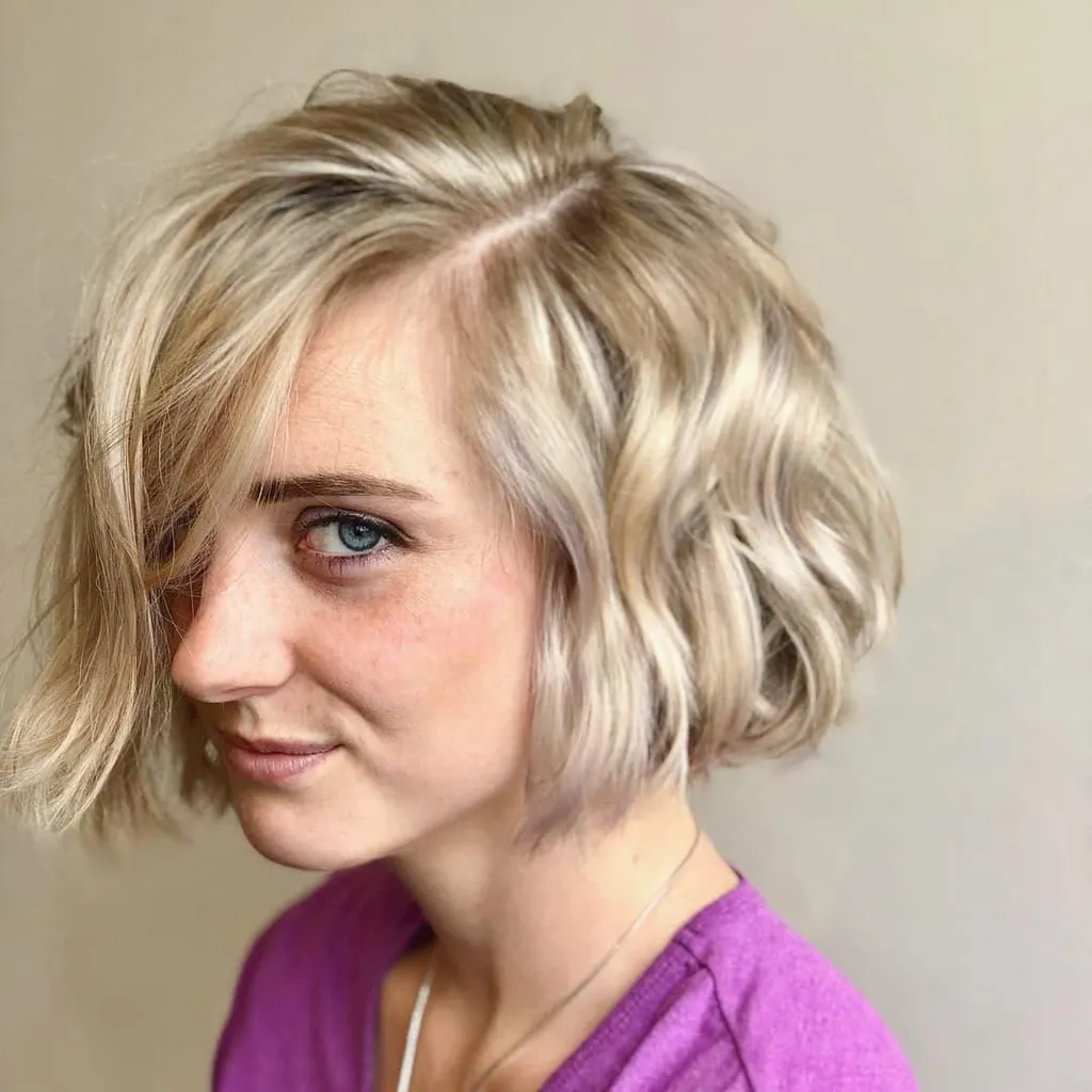 Hakelang strandbølget hårklipp' title=