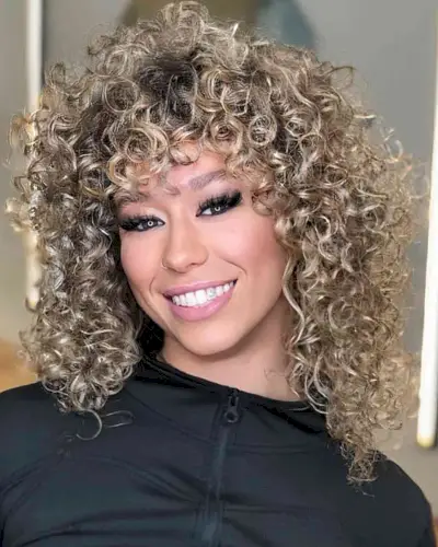 Voluminous Soft Blonde Curls