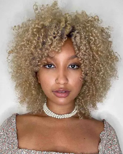 naturally curly dark blonde hair