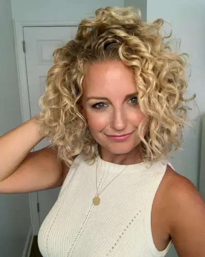 Buttery Blonde Short Curly Hair
