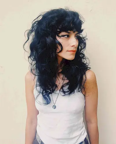 Curly Rocker Shag Cut for ladies with thick black hair