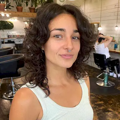 Middle Part Textured Shaggy Cut for Medium Curly Hair