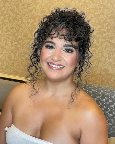 Face-Framing Updo with Curly Bangs