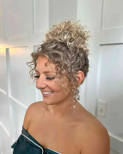 Cute Curly Updo with Tendrils for girls attending a formal event