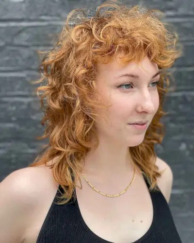 Shoulder-Length Wolf Haircut with Short Bangs