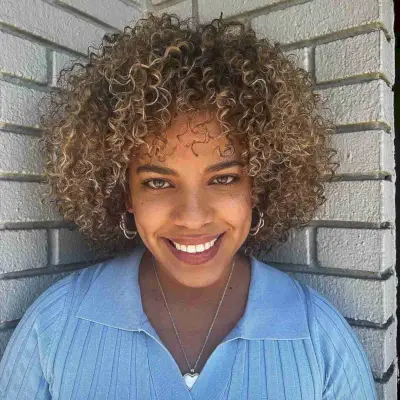Short Corkscrew Curly Haircut for Black Women