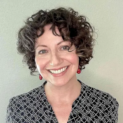 Short Glowing Curly Bob with Fun Fringe