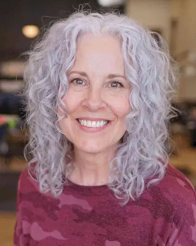 Medium-Length Gorgeous Gray Curls with a Middle Part