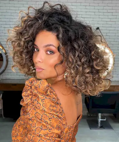 wonderful shoulder-length curly bob with loose curls