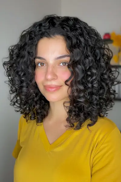 short tight curls on medium hair