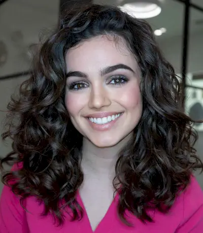 natural curls with a side part