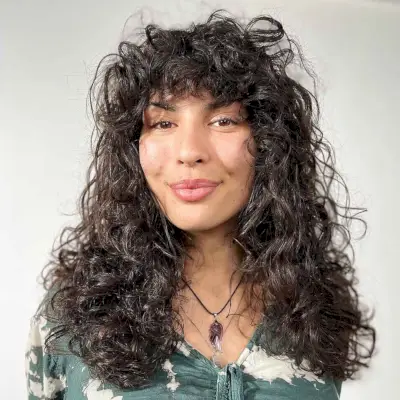 Layered Curls with a Thick, Curly Fringe