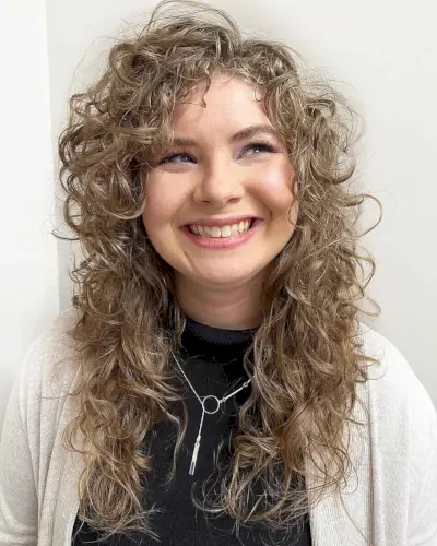 Side-Parted Curls with a Tousled Texture