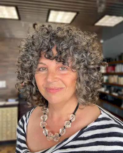 Grey Curly Hair with Bangs for Older Women