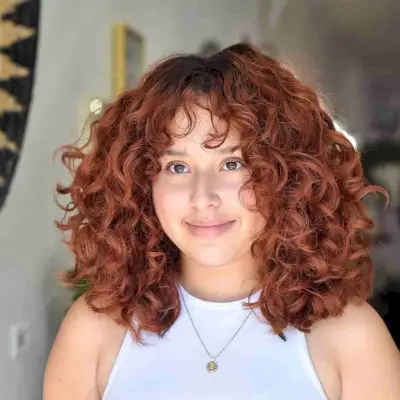 Red Curls with Wispy Bangs
