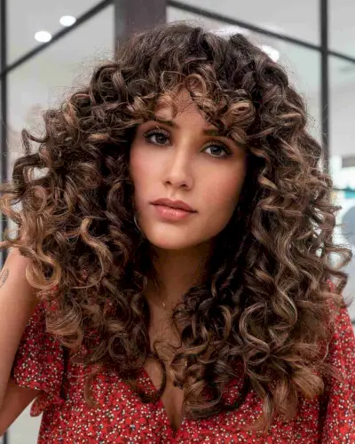 Medium-Length Thick Curly Hair with Fringe