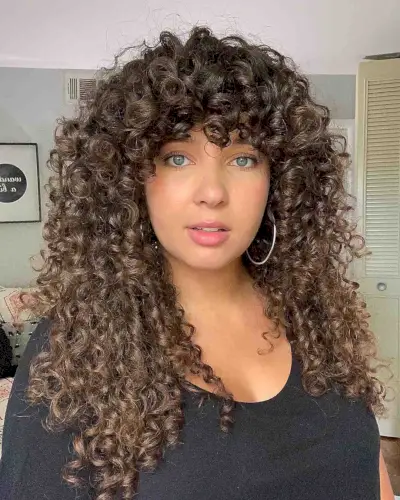 flattering bangs for curly hair