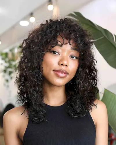 Wet Looking Curly Hair with Fringe